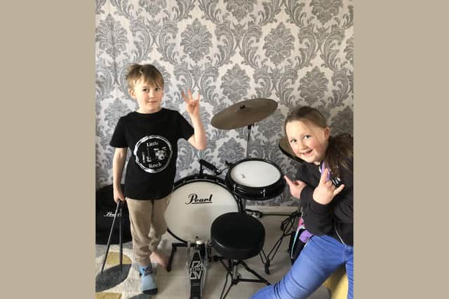 Brooklyn, who is an ACDC fan, has been playing guitar for almost three years now and Rowan has been doing drums for his sister for about a year and a half.