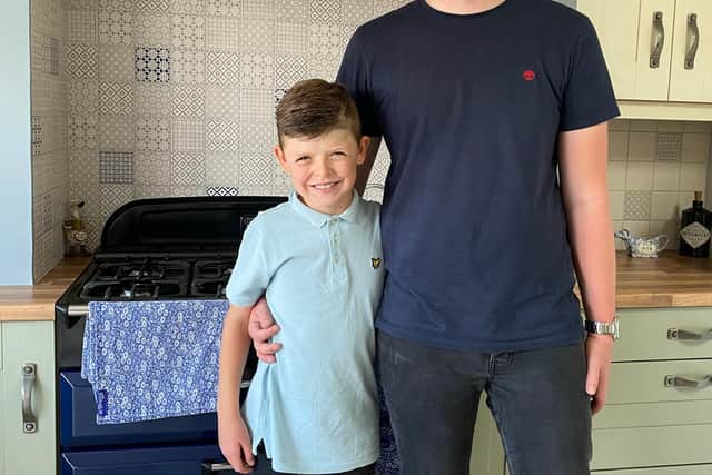 Daniel Bradley pictured with his older brother Jak Frost, who is helping raise awareness for the youngster's fundraising efforts