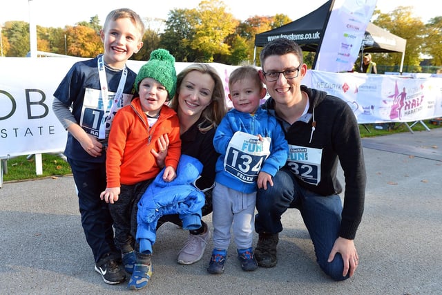 These fun runners at a past Chesterfield Half Marathon pose for the camera at the finish line.