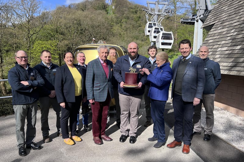 Andy Gaskell, Guy Slater, Sophie Pugh, David Webster, Andrew Pugh, Stephen Scott, Adam Bowling (with cake), Bradley Jenkins, Vanessa Pugh, Rupert Pugh and Tim Peet, left to right, celebrate the cable cars' 40th birthday at the Heights of Abraham, Matlock Bath.
