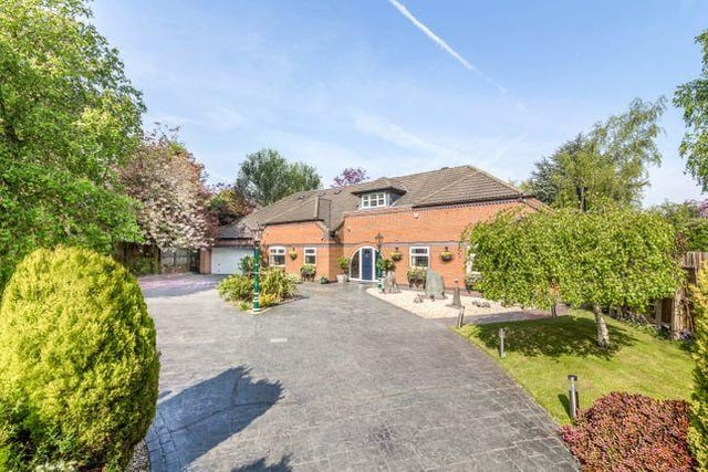 This five bedroom house has a games room, oak panelling and marble fireplace. It is marketed by Elite Homes UK, 0115 774 8861.