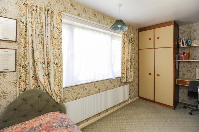 The third bedroom could double as a dressing room or office to suit.