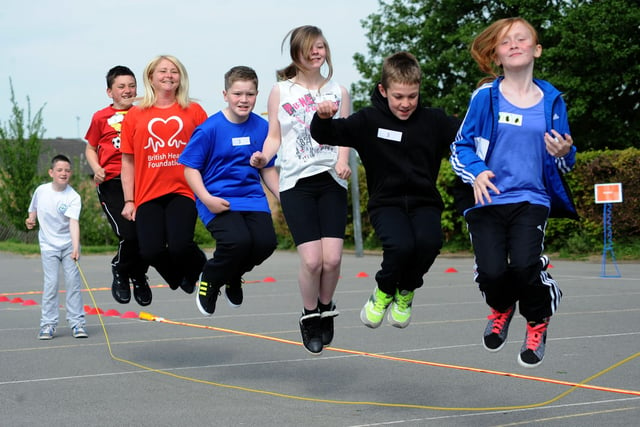 Pupils and staff from the Ladywood Primary School jump to a fundraising challenge for the British Heart Foundation.