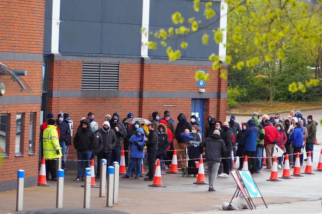 Spireites fans queueing for tickets for the last home match of the season against Dagenham and Rebridge.