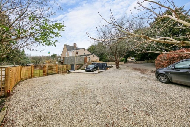 Block paving to the front of the house and the property's large gravelled hardstanding provides parking space for multiple vehicles.