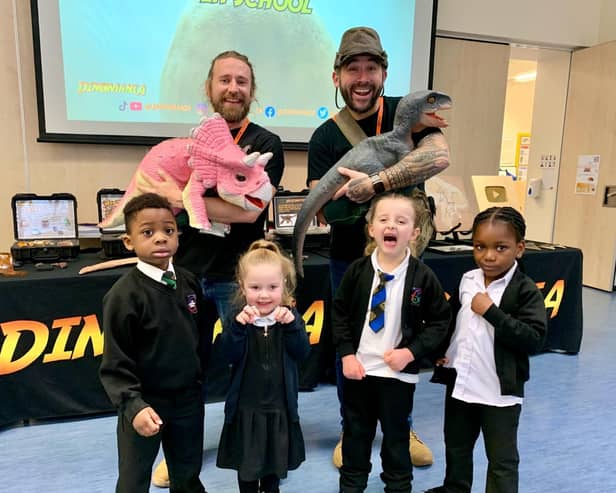 Pupils Owen, Lyla, Shayla and Eloghosa with the 'baby' dinosaurs at Dinomania