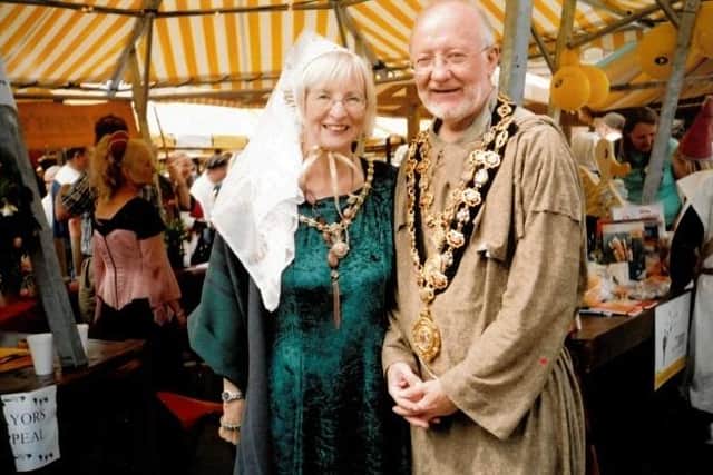 Glenys with her husband Keith at  Chesterfield's medieval market during Keith's year as mayor.
