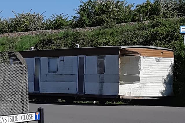 Residents say the large caravan has been dumped on Eastside Road on Whittington Moor for the last two and a half months.