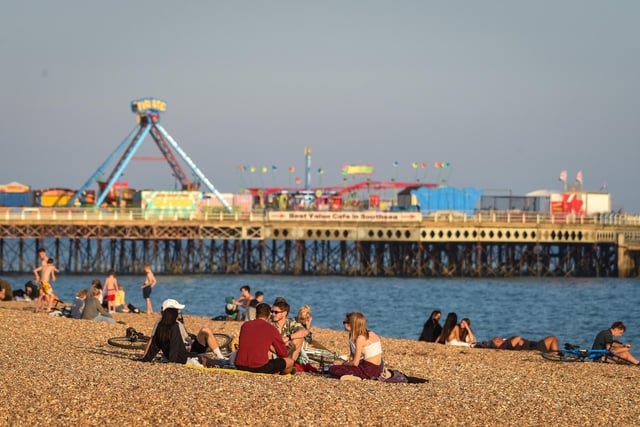 People enjoy the evening sunshine on Southsea beach on September 21, 2020 in Portsmouth. Picture: Finnbarr Webster