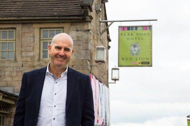 Mr Perez outside the Peak Edge Hotel and Red Lion pub, which he bought in 2017.