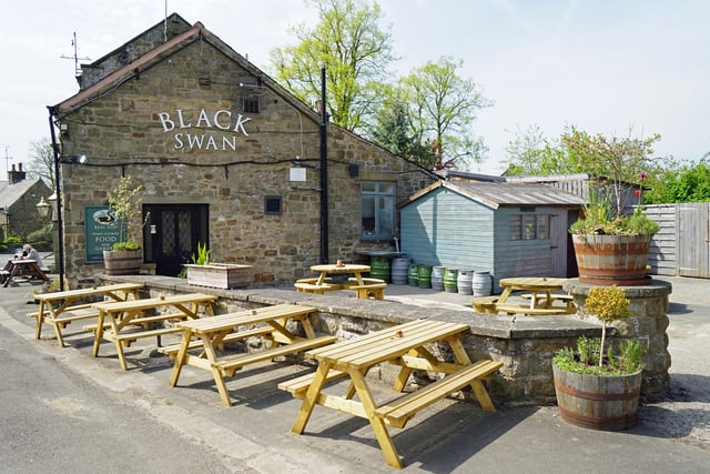 This photo shows more of the outdoor seating on offer at the pub.