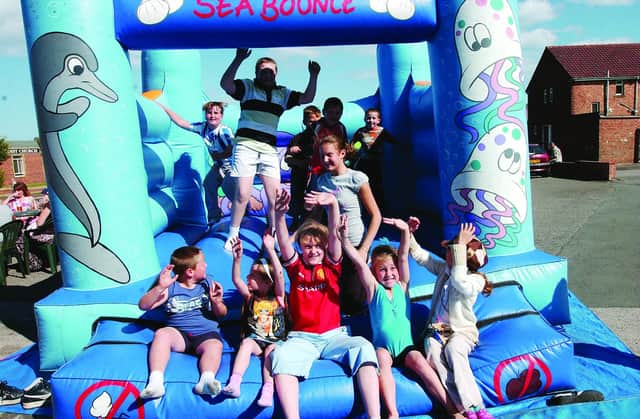 Were you pictured on a bouncy castle in the King Oswy area in  2005?