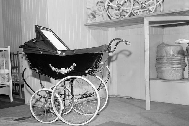 A pram in William Borthwick's baby shop in Cockburn Street which was to be gifted to one of the first babies of 1963 by the Evening Dispatch.