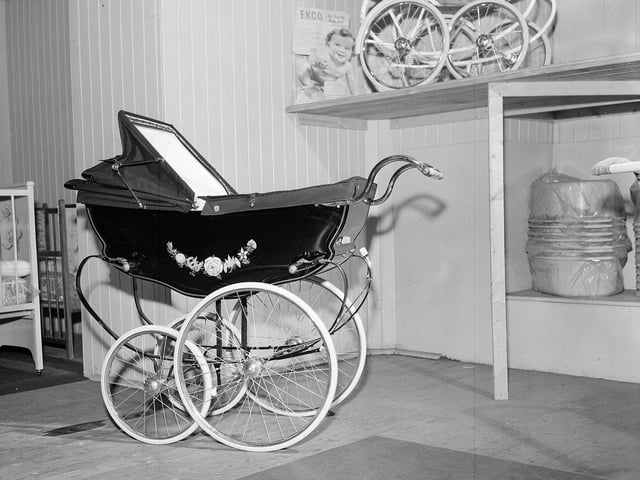 A pram in William Borthwick's baby shop in Cockburn Street which was to be gifted to one of the first babies of 1963 by the Evening Dispatch.