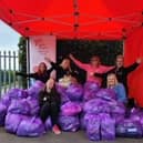 Slimming World consultants Kerry Wight, Rachel Plevey, Natalie Brannigan, Sabrina Kemp, Gina Harvey and Jane Engmann  with unwanted clothing collected at Eastwood Park in Hasland from members who attend their groups in north Derbyshire.