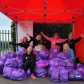 Slimming World consultants Kerry Wight, Rachel Plevey, Natalie Brannigan, Sabrina Kemp, Gina Harvey and Jane Engmann  with unwanted clothing collected at Eastwood Park in Hasland from members who attend their groups in north Derbyshire.