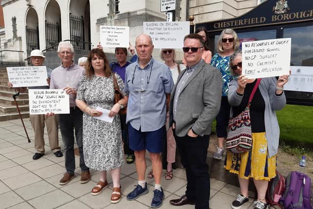 Protestors opposed to the Duckmanton housing scheme gather outside Chesterfield town hall