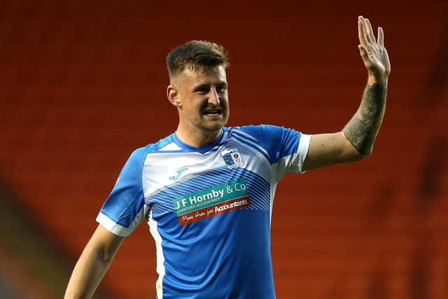 Scott Quigley, pictured playing for Barrow, has joined Stockport County.
