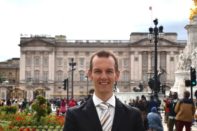 Shirebrook man James Taylor, ardent devotee of the Royal Family, pictured outside Buckingham Palace.
