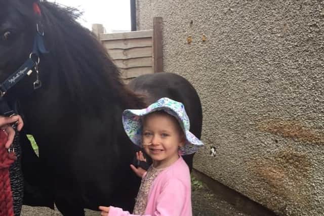 Isla with Florence the Shetland pony