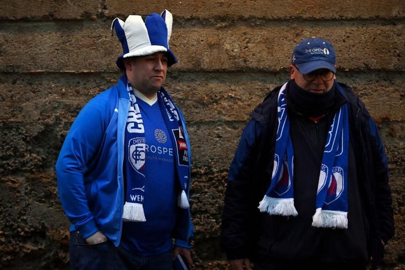 Fans of Chesterfield look on from outside of the stadium ahead of Chelsea v Chesterfield at Stamford Bridge.