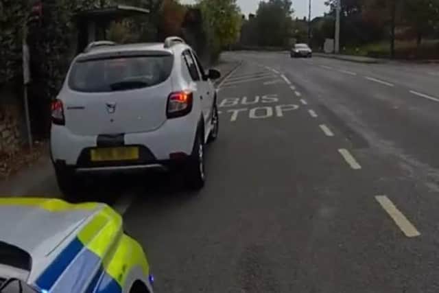 Man arrested after police discover knife and suspected drugs in ...