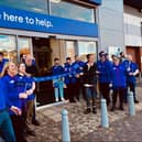 Staff celebrate the reopening of the Currys store at Ravenside retail park, Chesterfield, following a flood caused by Storm Babet in October 2023.