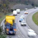 A car has overturned causing delaays for drivers this morning.