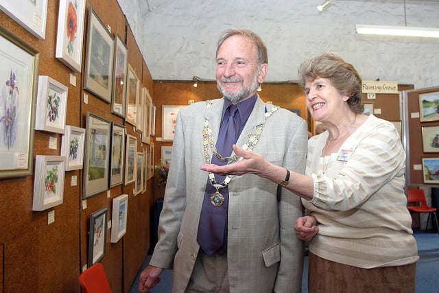Amber painting art group exhibition at Cromford Mill art gallery. Opened by Chairman Duffield parish council John Rice seen with chairman amber art group Wendy Tait in 2007