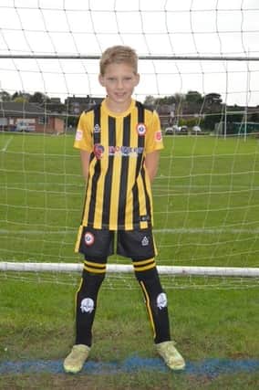 An Ivanhoe player in the new kit.