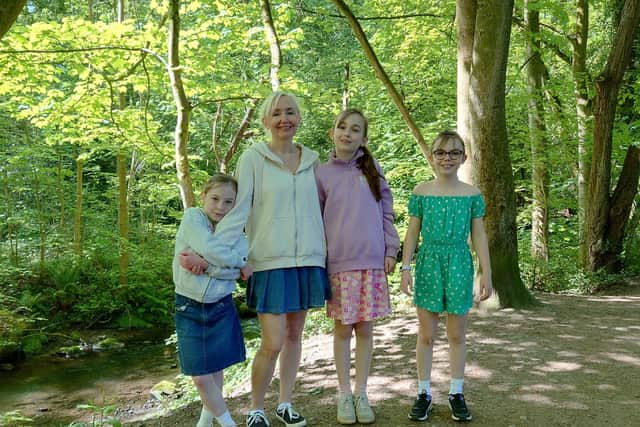 Genna with her three youngest children, Beatrice, Charlie and Holly, pictured left to right.