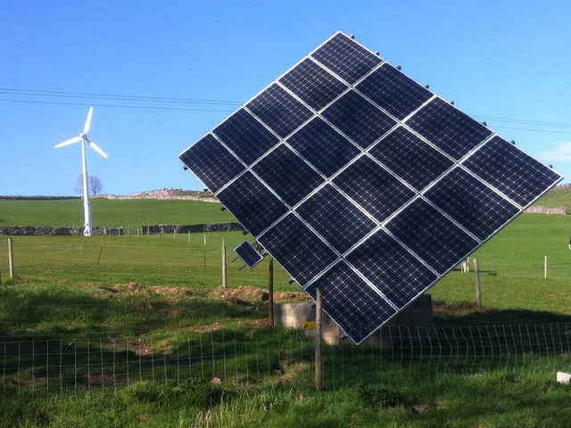 A 10kw wind turbine and a sun-tracking solar panel at Hoe Grange Holidays near Brassington