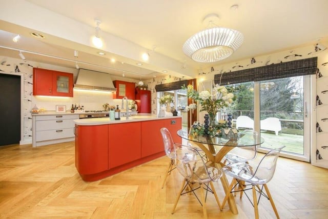 The bright and stylish kitchen diner is flooded with natural light through the patio doors.