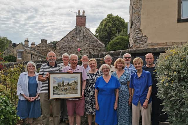 Mike was presented with an original painting of the almshouses by local artist Michael Groves.