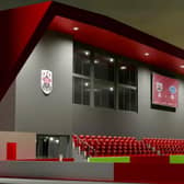 The new building will be at the current 'car park end' at the NMG.