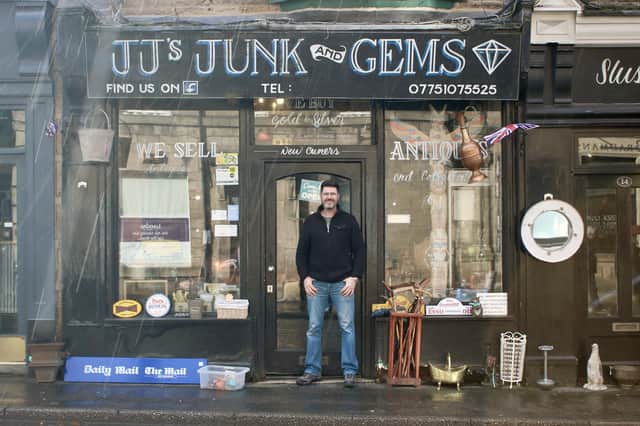 John outside JJ's Junk and Gems, Matlock