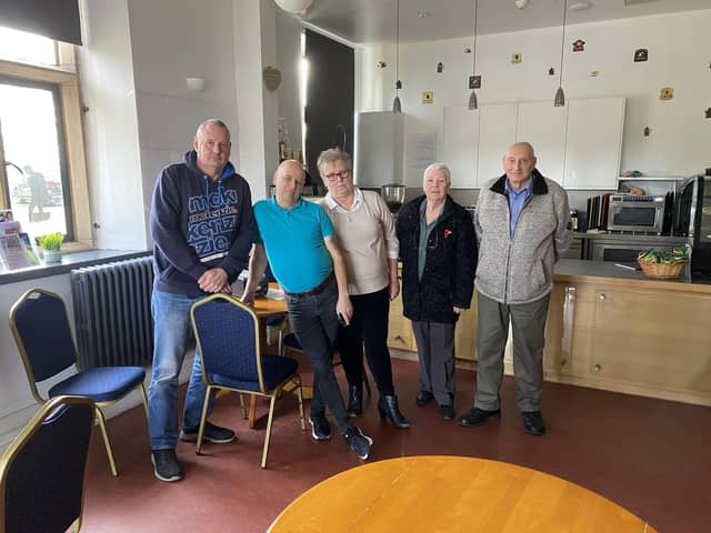 Independent Staveley town councillors Dean Rhodes, Paul Mann and Cheryl Jackson with Margaret Cooper and Joe Roberts in the empty Staveley Hall Cafe. Picture by Christina Massey.