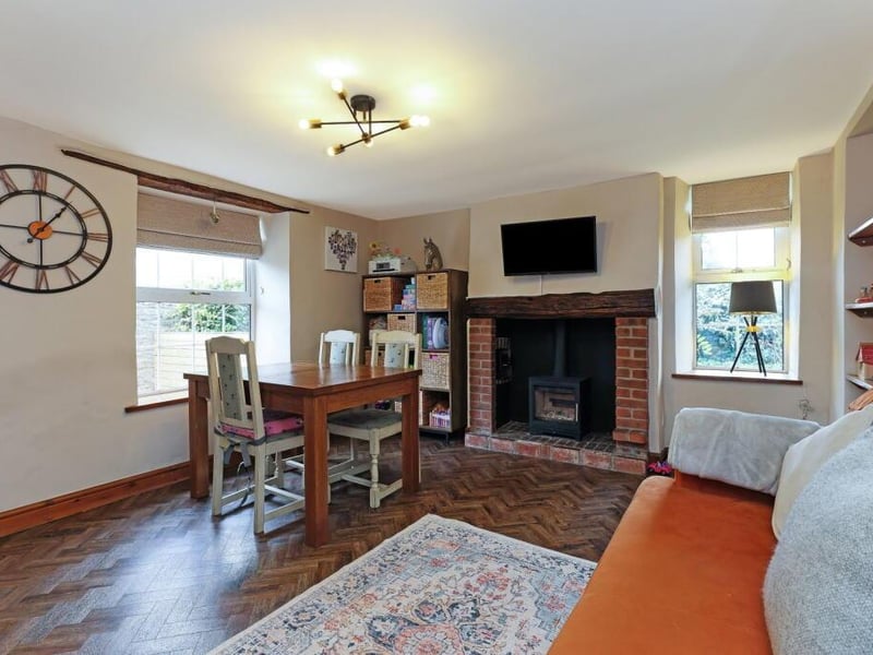 The cottage has a double aspect dining room.