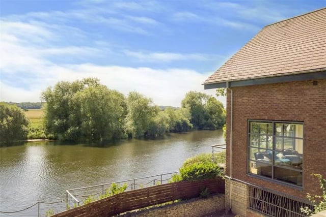 Outside of the property is a gated driveway providing off road parking for multiple vehicles and patio areas surrounding the house leading up to the balcony areas along with a private mooring to the River Trent.