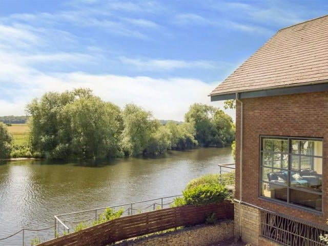 Outside of the property is a gated driveway providing off road parking for multiple vehicles and patio areas surrounding the house leading up to the balcony areas along with a private mooring to the River Trent.