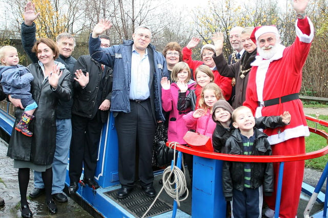 Father Christmas meets the first passengers aboard the Santa Special cruise, leaving Tapton Lock in 2009.