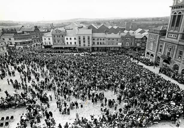 Chesterfield marketplace is filled with people for the visit of the Prince and Princess of Wales, November 1981.