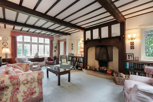 Wooden beams, an open fireplace and leaded windows add character to the lounge.