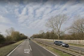A section of the A38 remains closed after the crash.