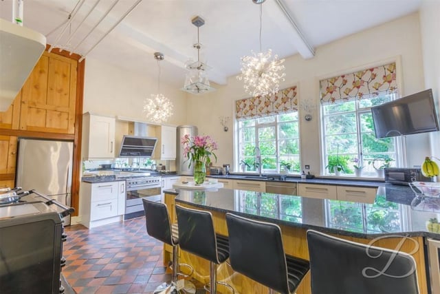 It might be a mansion dating back to the Victoran era, but its gorgeous, glossy kitchen belongs firmly in the modern-day world. It comes complete with an integrated oven with five-ring gas hob, wine fridge, storage cupboards, TV point and ample worktop space.