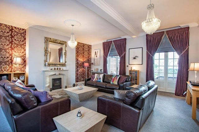 The sitting room has 'excellent proportions and a certain feeling of grandeur', says the estate agent.