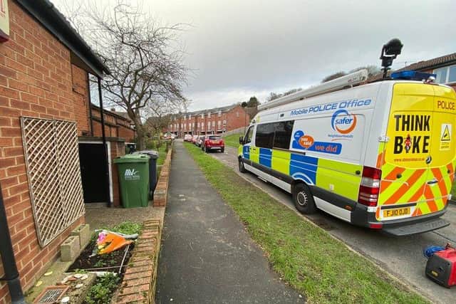 Derbyshire police on Acorn Drive, Belper, following the tragedy.