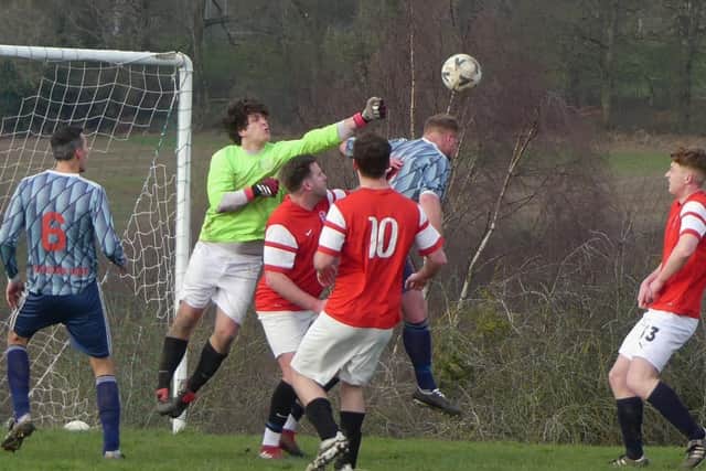 Action from Sunday's game between Hepthorne Lane (in grey) and Butchers Arms. All photos by Martin Roberts.