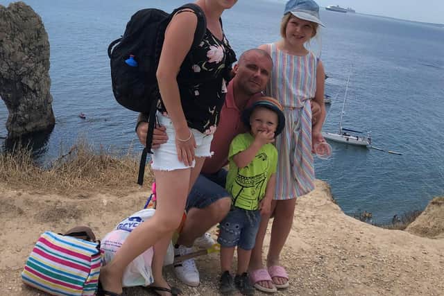 Tom Cotterill with his wife Laura and children Anya and Jude