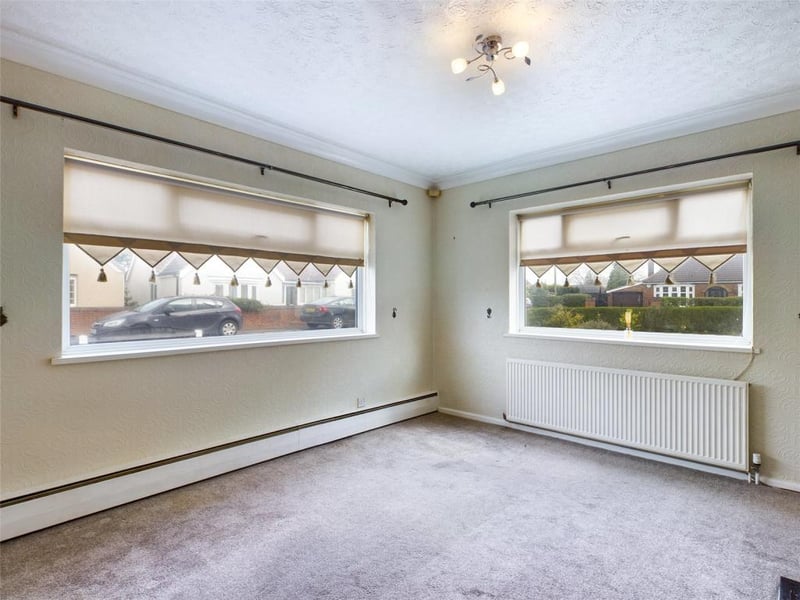 Lounge with front and side double glazed windows